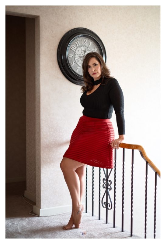 Woman leaning on banister