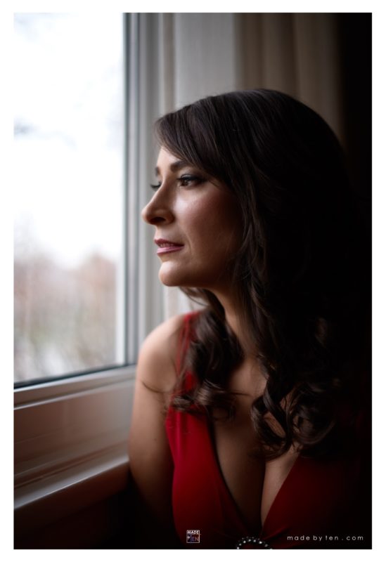 Woman Looking out Window