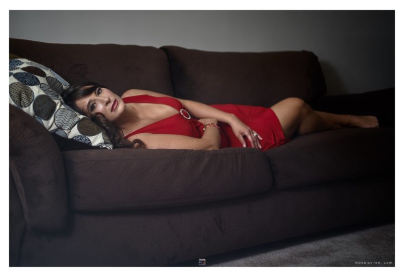 Woman lying on bed
